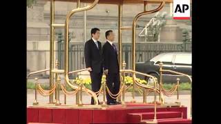 New Japanese PM Shinzo Abe meets Chinese Premier Wen Jiabao