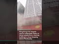 Hong Kong Firefighters Rescue People From Burning WTC Tower