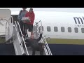 Senator Tommy Tuberville Falls Down The Stairs Getting Off Airplane