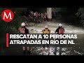 Rescatan a familia atrapada en medio de la corriente del río La Silla