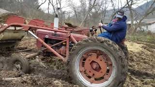 farmall H action! feeding hay in the rain! a farmall story from my youth!