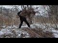 winter bushcraft. building a survival shelter in a cold forest survival skills in the wild. asmr