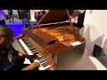 kris nicholson test driving the yamaha c6x american satin walnut at namm 2024