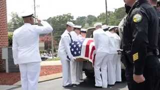 Pallbearers carry Logistics Specialist 2nd Class Randall Smith