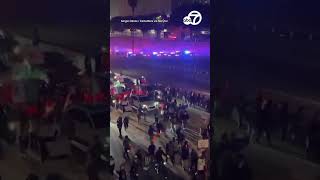 Thousands of anti-ICE protesters block freeway, streets in downtown LA