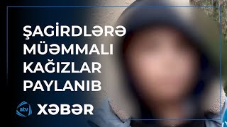 Şagirdlərə paylanılan kağızların üzərində görün nə yazılıbmış