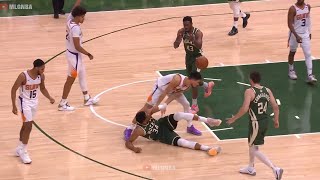 Giannis was getting up and Devin Booker shoved him down 🤭 Suns vs Bucks Game 3
