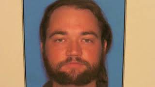 Police Seek Murder Suspect