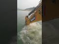 excavator doing underwater breaking constructing job