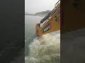 excavator doing underwater breaking constructing job