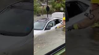 FL Firefighters Rescue Woman Trapped in Car Amid Hurricane Ian Floods