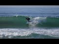 ryan burch and koby hughes surfing with dolphins at home in december