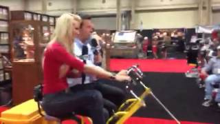 April Rose and Justin Bell take the Rhoades Car GoBoy X2 through Barrett Jackson