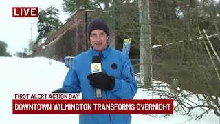 Meteorologist Colin Hackman snowboarding down Nun Street