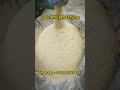 corn mill machine in action creating fine textured cornmeal