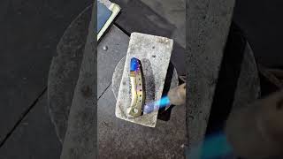 Heat anodizing on titanium #knifereview #titanium #handmade