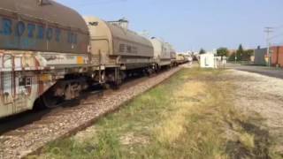 Outbound Union Pacific Manifest flies out of Elmhurst Metra station