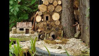 Man Discovers A Family Of Mice Living In His Garden, Builds Them A Miniature Village..