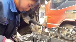 Meet the Female Mechanic Mastermind - Engine Repair at its Finest!