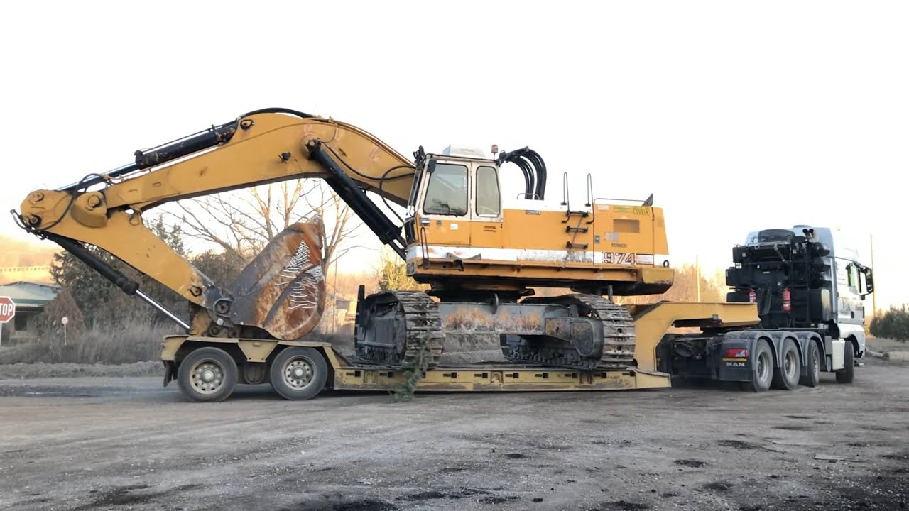 Transporting The Liebherr 974 Excavator By Side - Fasoulas Heavy ...