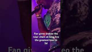 Fan gives @DrakeoTheRulerOfficial chain at long live the greatest tour