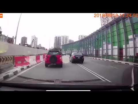 10jun2018 SGQ603M nissan latio overtaking dangerously over double white lines @ marina parade road 10jun2018 SGQ603M nissan latio overtaking dangerously over double white lines @ marina parade road