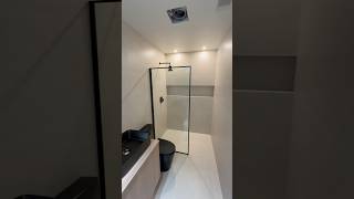 Curbless shower with 48x48 tiles and Schluter® System—seamless perfection!”