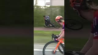 Spectator Crashes While Riding Alongside Peloton! #shorts