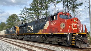 CN ES44AC 3855 Leads Empty Phosphate CSX B210-17 at Sandy Ford