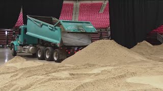 Inside look as Viejas Arena transforms into beach volleyball court