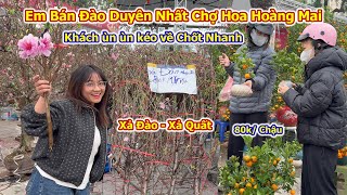 Crowds of people flocked to Hoang Mai Spring Flower Market, where peach and kumquat trees were be...