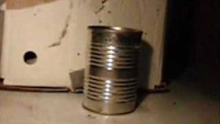 12 gram CO2 capsule through a tin can slow motion