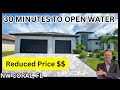 NEW CONSTRUCTION 30 MINUTES TO OPEN WATER REDUCED TO SELL #220 | NW CAPE CORAL FL