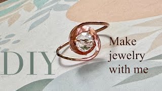 Make this ring with some wire and a bead