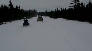 ATV`s sharing their trail to snowmobiles