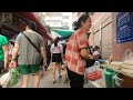 daily life in chongqing china，women are buying agricultural and sideline products