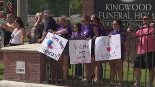 People lined streets in Houston to honor 12-year-old boy, and his family, killed in flood
