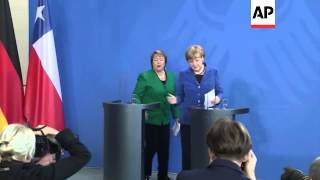 Military honour guard as Chancellor Merkel welcomes President Bachelet  of Chile