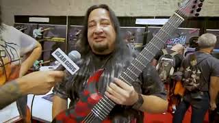 Dino Cazares showing his Signature Guitar from Ormsby