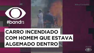 São Leopoldo: carro incendiado com pessoa algemada dentro