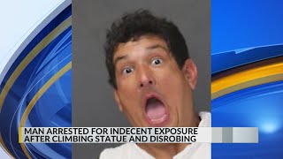 Man arrested for indecent exposure after climbing on top of statue and disrobing