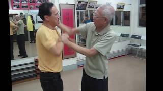 Chu Shong Tin Chisau with a late Ip Man student - Wing Chun legend!