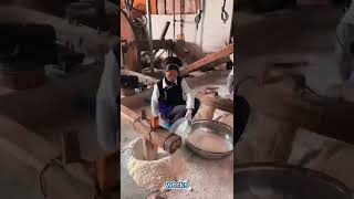 How a traditional waterwheel works for pounding wheat