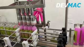 ENVASADORA AUTOMATICA DE PRODUCTOS LIQUIDOS DE 4 BOQUILLAS