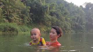 Prepare the materials to build a firewood storage shed and enjoy a peaceful river bath amidst nature