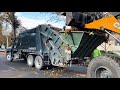 Leaf Collection - Loadmaster Rear Loader Garbage Truck Packing Heavy Bulk Leaf Piles