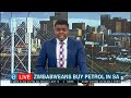 Zimbabweans buy petrol in SA