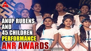 Anup Rubens and 45 Children Live  Perform Manam Movie Song at ANR Awards