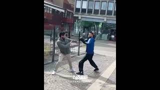 ملاكم عراقي في السويد يضرب سلوان موميكا حارق نسخ المصحف الشريف في أحد شوارع ستوكهولم