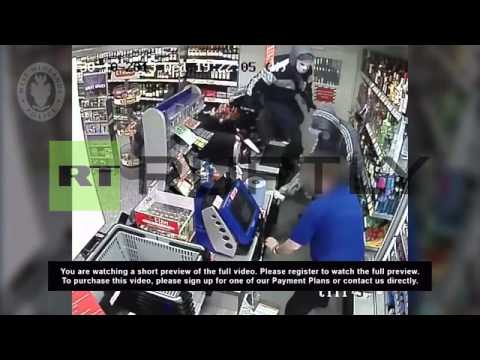 UK: CCTV Footage Shows Shopkeeper Stabbed In Store Robbery - YouTube